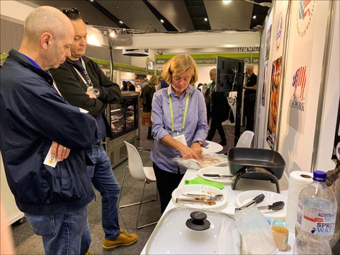 Visitors to the USMEF booth sampled many U.S. pork products, including pre-cooked bacon and pulled pork