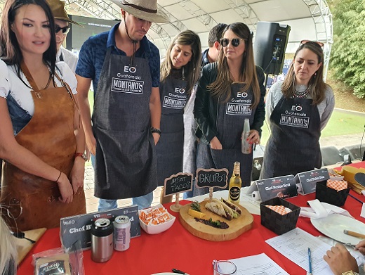 Participants in the USMEF barbecue challenge in Guatemala display dishes prepared using U.S. pork baby back ribs and U.S. beef tri-tip